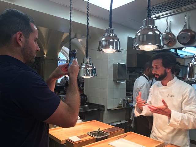 Avillez 11 – Chef Jose Avillez takes questions from viewers during a Facebook live in his kitchen.